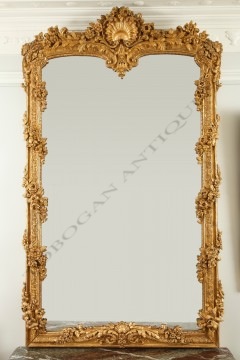 Exceptionnel  miroir <br/> en bois doré