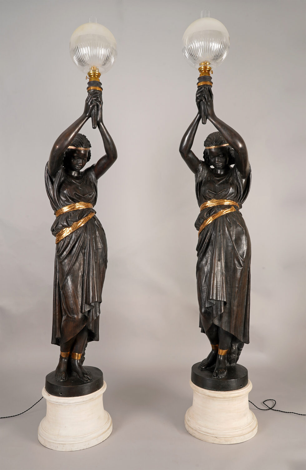 M. Moreau et Val d&rsquo;Osne <br/> Paire de torchères « Nubiennes »