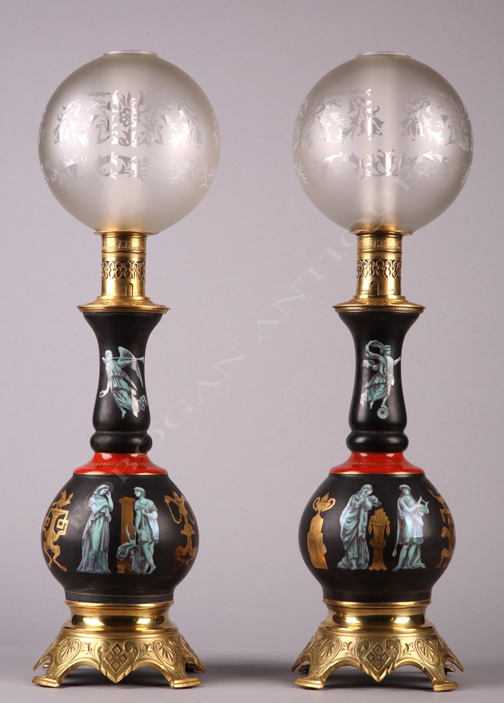 Pair of Pompeian style<br />porcelain lamps